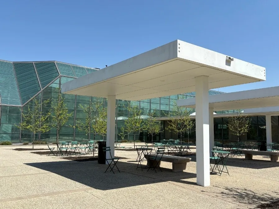 A recent photo of the canopies at the Irwin Union Bank Building in Columbus shows seating areas below them 